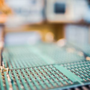 Microcircuits and components lie on metal plates