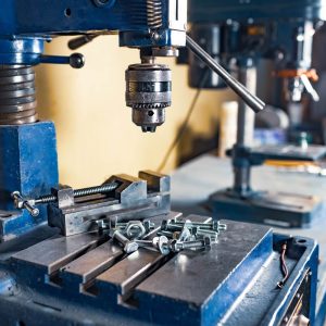 metal-chrome-bolts-and-nuts-lie-on-the-drilling metal chrome bolts and nuts lie on the drilling